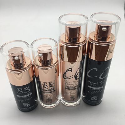 Las botellas de cristal de la loción del maquillaje 30ml 50ml con forma del cilindro de bomba modificaron color para requisitos particulares